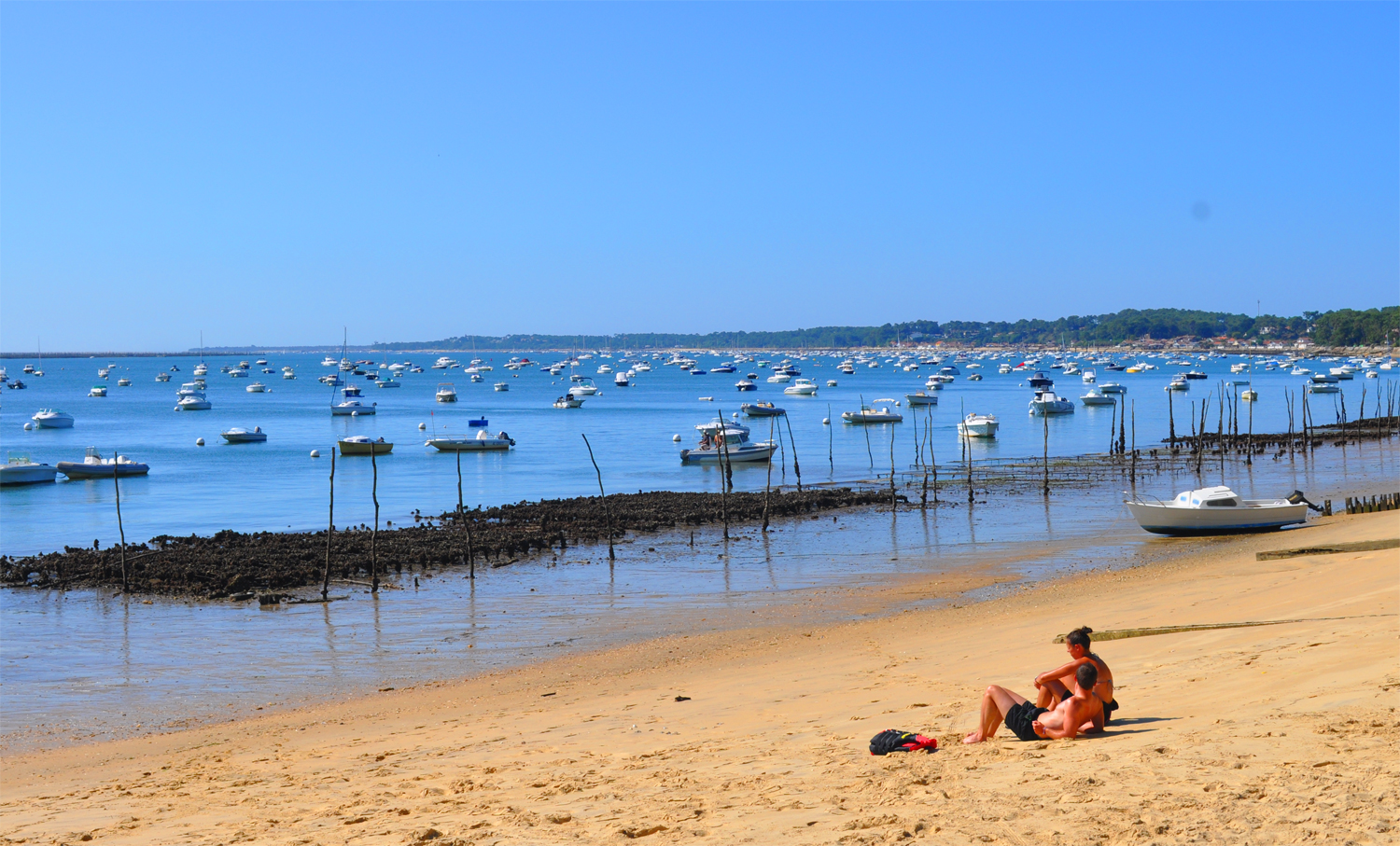 Plage et peaux dorées à Grand Piquey